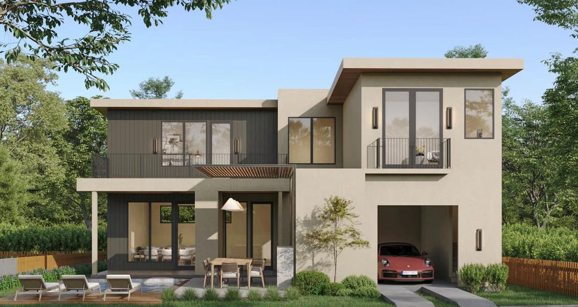 Back of property with a balcony, a patio area, and stucco siding Back of property with a balcony, a patio area, and stucco siding