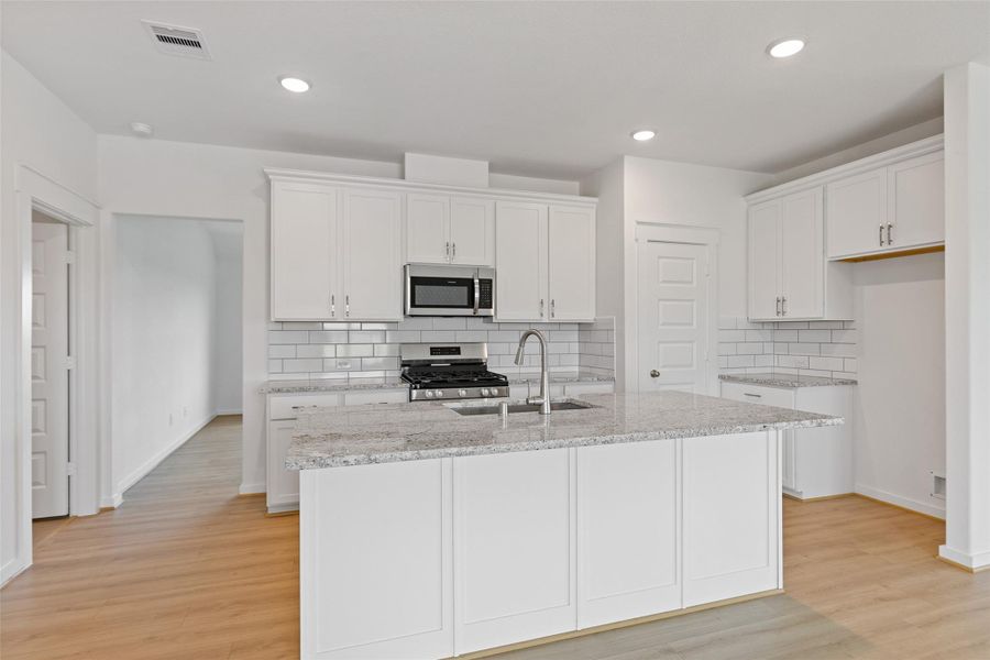 Furnished interior view inside a new home in Sunterra, Katy (Image 4). Furnished interior view inside a new home in Sunterra, Katy (Image 4).