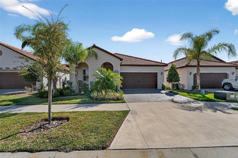Front exterior of a new home in Southshore Bay Active Adult, Wimauma, FL, highlighting curb appeal (Image 28).
