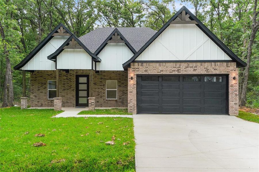 Front exterior of a new home in , Trinidad, TX, highlighting curb appeal (Image 25).