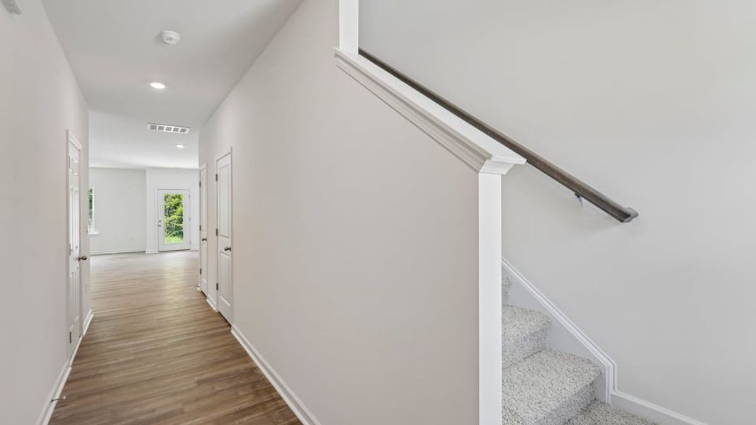 Spacious, unfurnished interior of a new home in The Townes at Belle Grove, Wendell (Image 7).