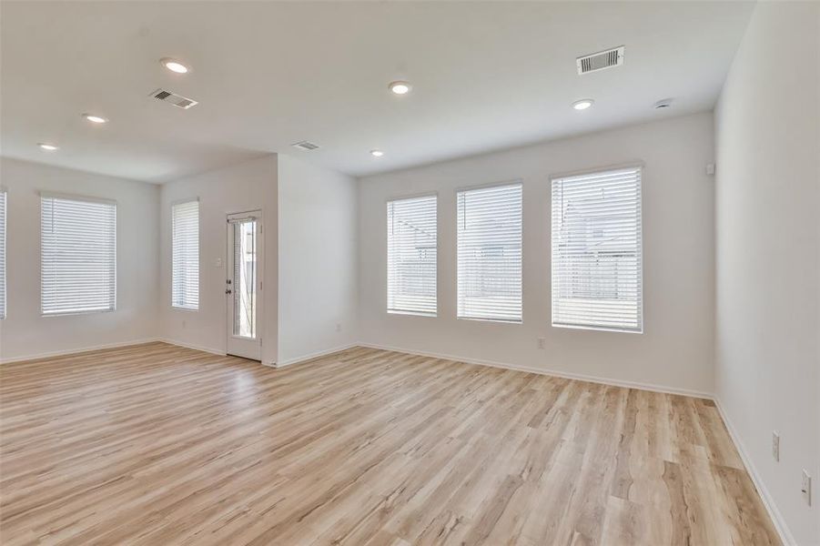 View of family room leading into the breakfast nook.