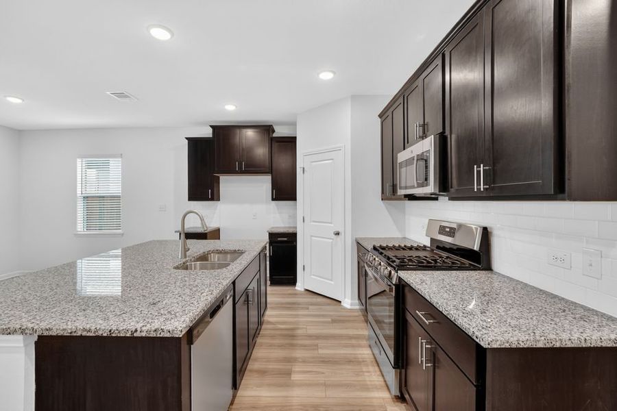 Furnished interior view inside a new home in Lisso, Pflugerville (Image 7).