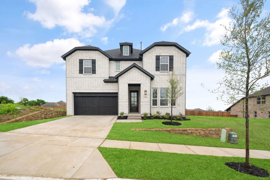 Front exterior of a new home in Legacy Hills, Celina, TX, highlighting curb appeal (Image 22).
