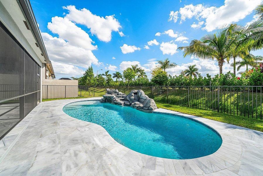 Exterior details and patio area of a home in Valencia Grand, Boynton Beach (Image 4). Exterior details and patio area of a home in Valencia Grand, Boynton Beach (Image 4).