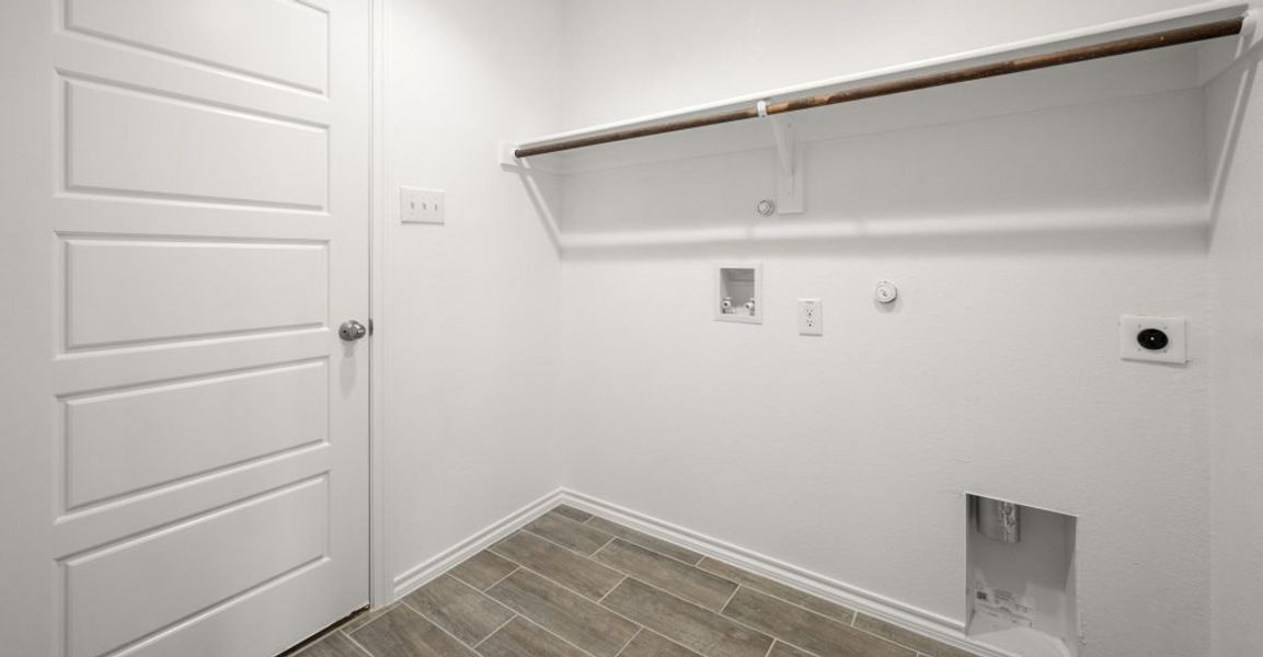 Representative exterior photo of a completed home built from the Atlanta by Impression Homes in Baker Farms, Cleburne, TX (Image 23). Representative exterior photo of a completed home built from the Atlanta by Impression Homes in Baker Farms, Cleburne, TX (Image 23).