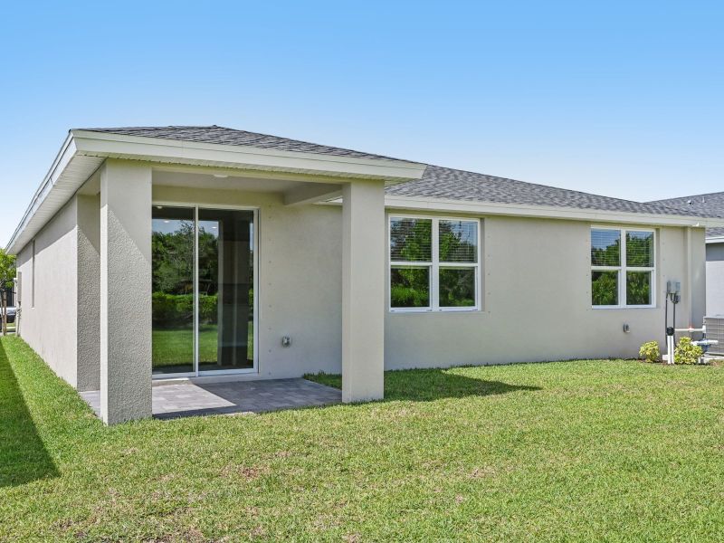 Exterior details and patio area of a home in Hampton Park - Classic Series, Vero Beach (Image 4). Exterior details and patio area of a home in Hampton Park - Classic Series, Vero Beach (Image 4).