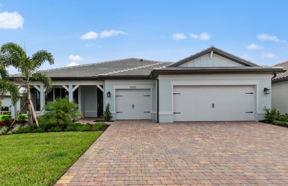 Exterior details and patio area of a home in Del Webb Naples, Immokalee (Image 1).