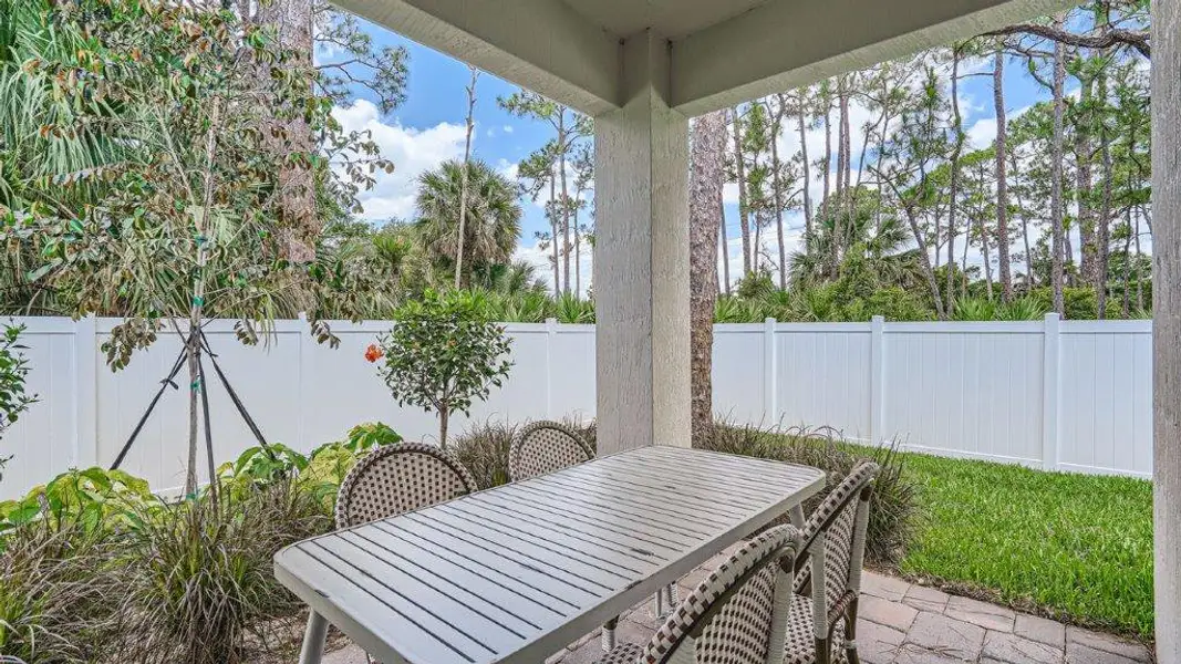 Exterior details and patio area of a home in Sandpiper Square, Stuart (Image 4).