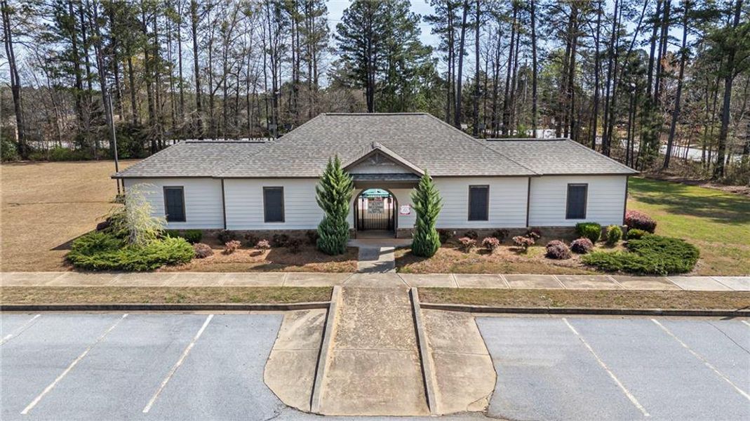 Front exterior of a new home in The Enclave at Flat Rock Hills, Stonecrest, GA, highlighting curb appeal (Image 2). Front exterior of a new home in The Enclave at Flat Rock Hills, Stonecrest, GA, highlighting curb appeal (Image 2).