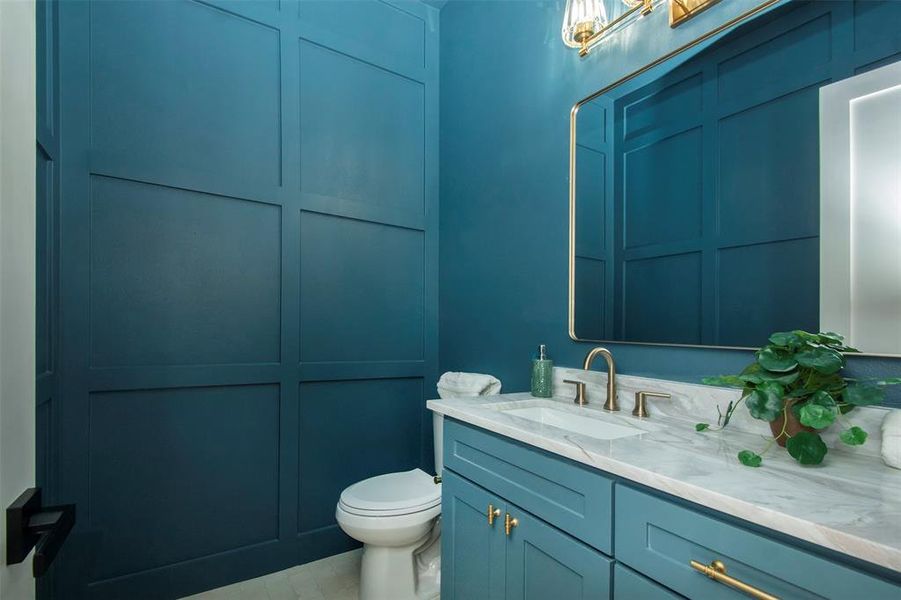 Bathroom with vanity and toilet