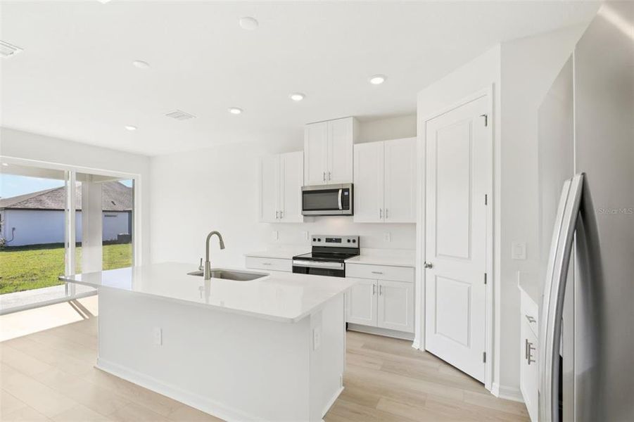 Furnished interior view inside a new home in Coasterra - Reserve Series, Palmetto (Image 13).
