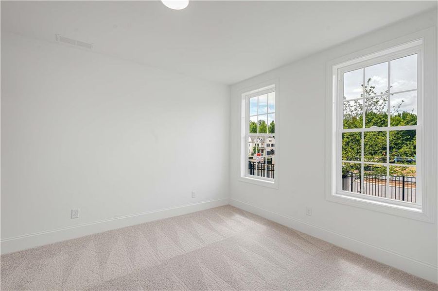 Spacious, unfurnished interior of a new home in Waterhaven, Cumming (Image 27).