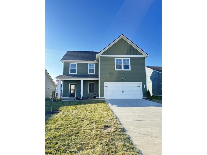 Front exterior of a new home in Sage Farms, White House, TN, highlighting curb appeal (Image 1). Front exterior of a new home in Sage Farms, White House, TN, highlighting curb appeal (Image 1).