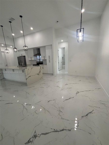 Furnished interior view inside a new home in , Cape Coral (Image 2). Furnished interior view inside a new home in , Cape Coral (Image 2).