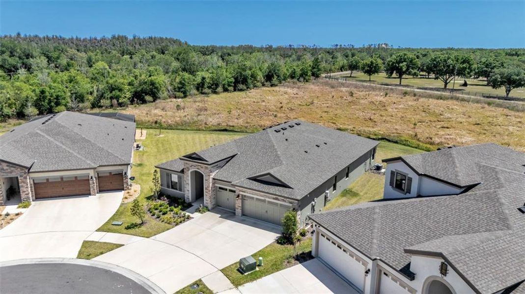 Front exterior of a new home in Hawkstone, Lithia, FL, highlighting curb appeal (Image 30).