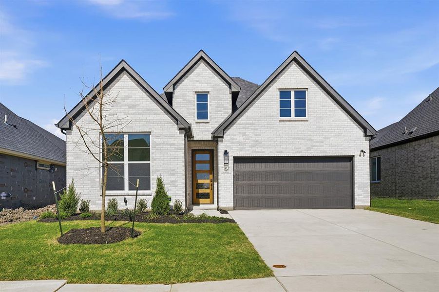 Front exterior of a new home in Devonshire, Forney, TX, highlighting curb appeal (Image 22).