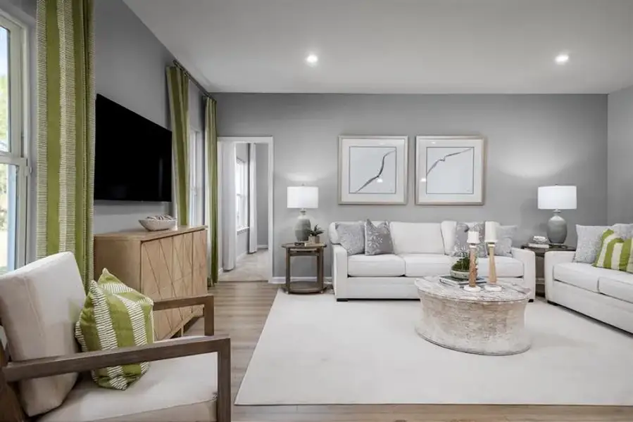 Representative furnished interior of a home built from the Baymont by Ryan Homes in Seminole Palms, Palm Coast (Image 4).