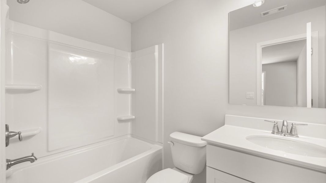 Representative furnished interior of a home built from the Grayson by D.R. Horton in Holland Estates, Powder Springs (Image 11).