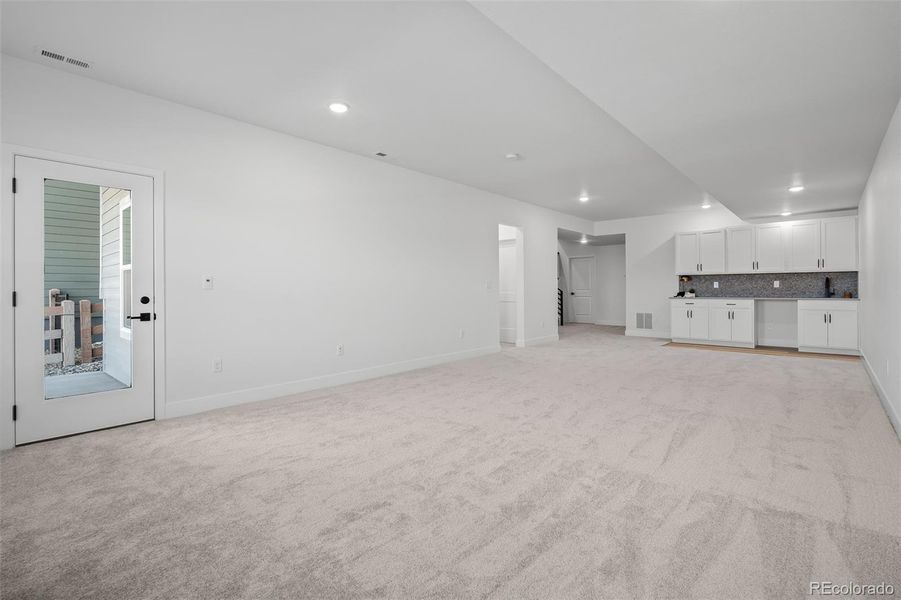 Spacious, unfurnished interior of a new home in Revel Crossing at Wolf Ranch - The Panorama Collection, Colorado Springs (Image 31).