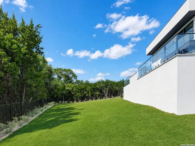 Exterior details and patio area of a home in , San Antonio (Image 42).