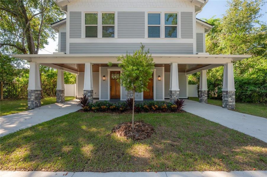 Front exterior of a new home in , Tampa, FL, highlighting curb appeal (Image 2). Front exterior of a new home in , Tampa, FL, highlighting curb appeal (Image 2).