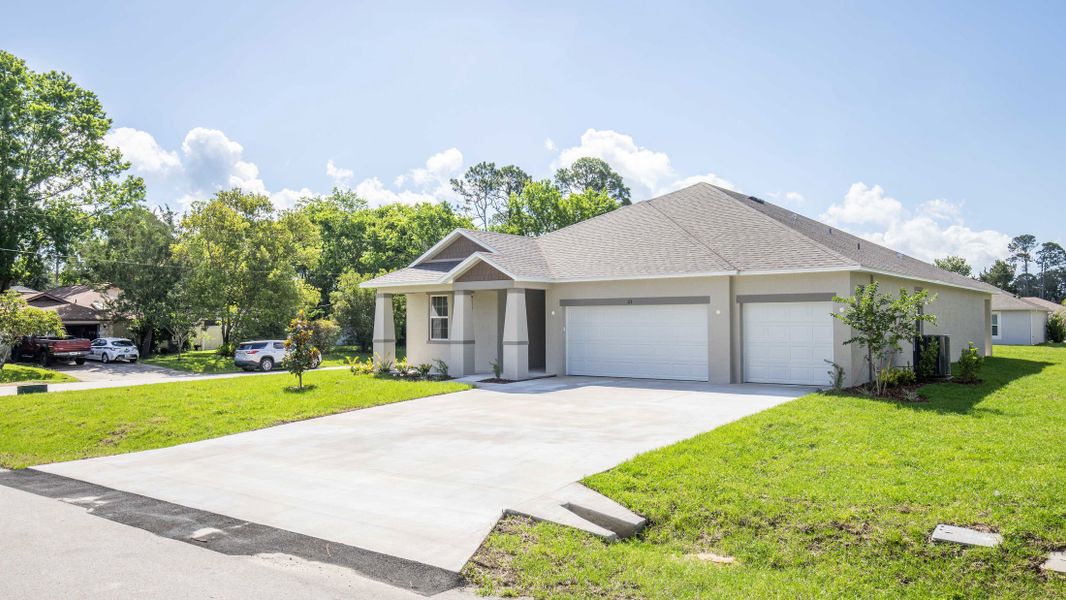 Representative exterior photo of a completed home built from the Naples by Maronda Homes in Golden Gate, Naples, FL (Image 17).