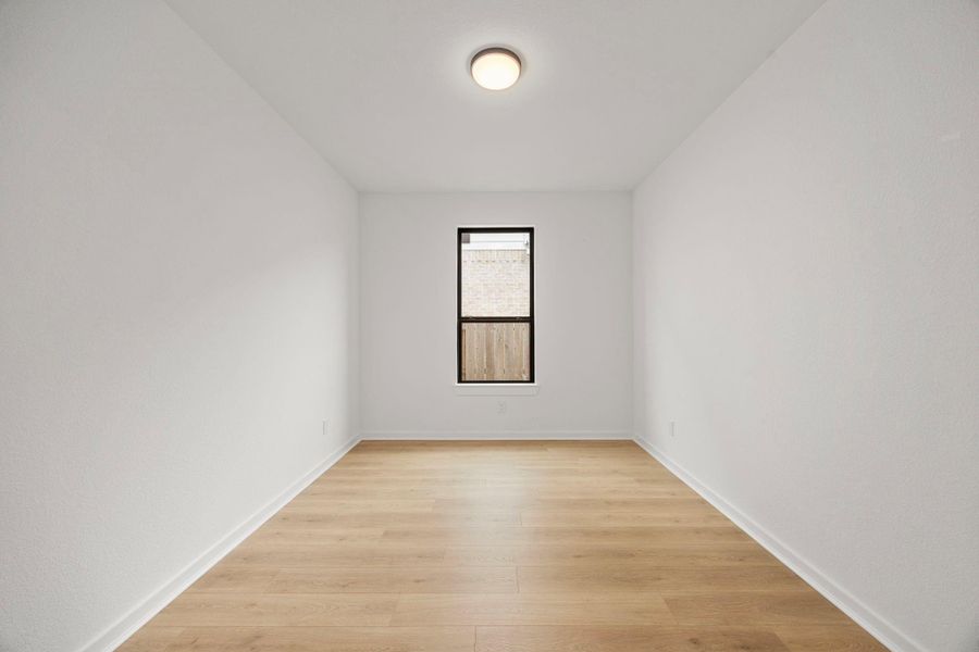 This office just down the entry hall could be a fifth bedroom. It has beautiful French doors for privacy.