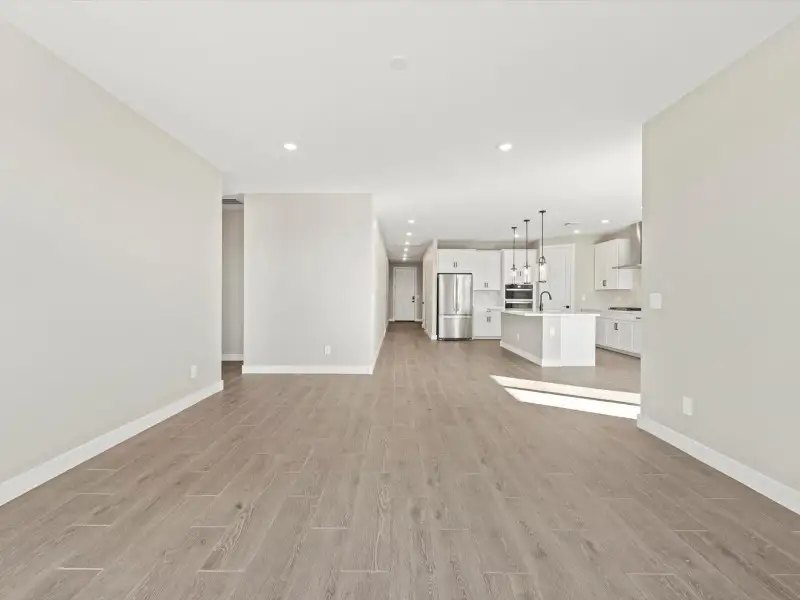 Spacious, unfurnished interior of a new home in White Tank Foothills Reserve Series, Waddell (Image 13). Spacious, unfurnished interior of a new home in White Tank Foothills Reserve Series, Waddell (Image 13).