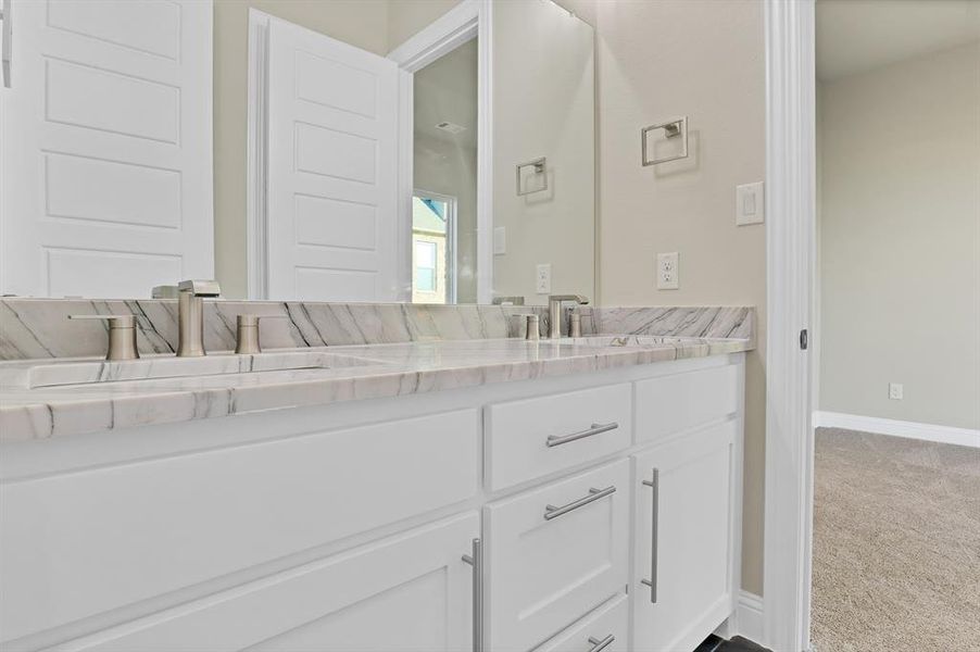 Bathroom featuring vanity