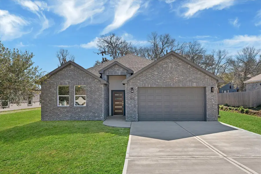 Front exterior of a new home in , Montgomery, TX, highlighting curb appeal (Image 2).