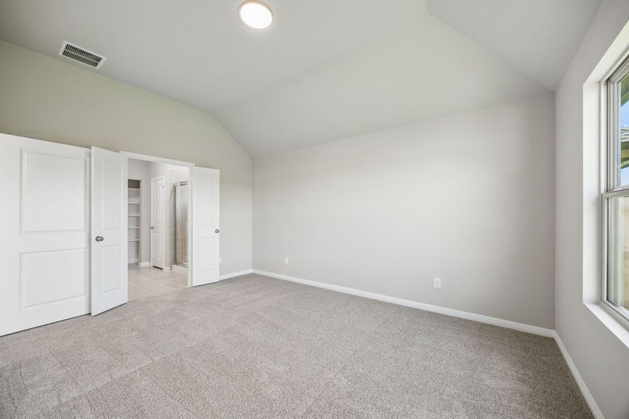 Primary Bedroom in the Sabine home plan by Trophy Signature Homes – REPRESENTATIVE PHOTO Primary Bedroom in the Sabine home plan by Trophy Signature Homes – REPRESENTATIVE PHOTO