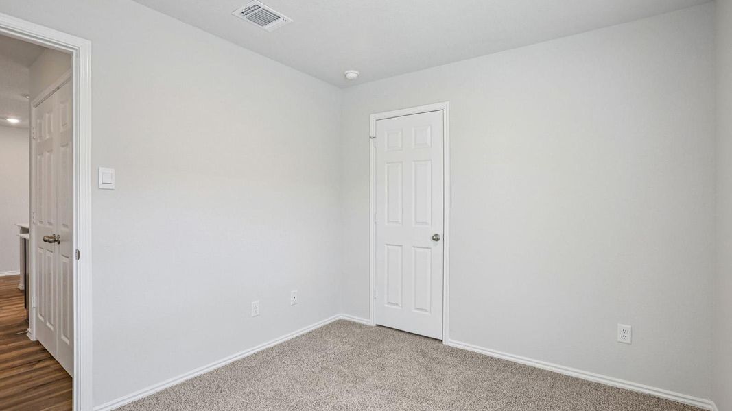 A well-proportioned bedroom with new carpeting and ample natural illumination awaits your personal touch. A well-proportioned bedroom with new carpeting and ample natural illumination awaits your personal touch.