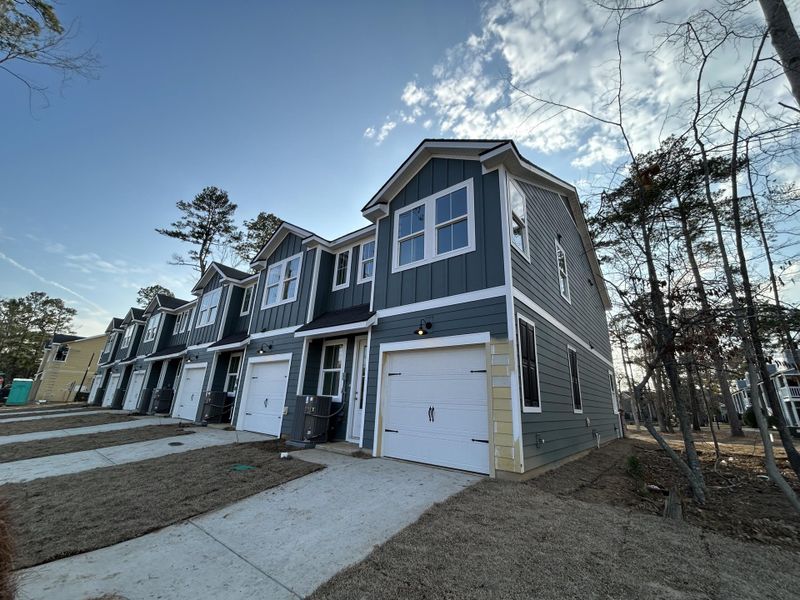 Front exterior of a new home in , Summerville, SC, highlighting curb appeal (Image 17).