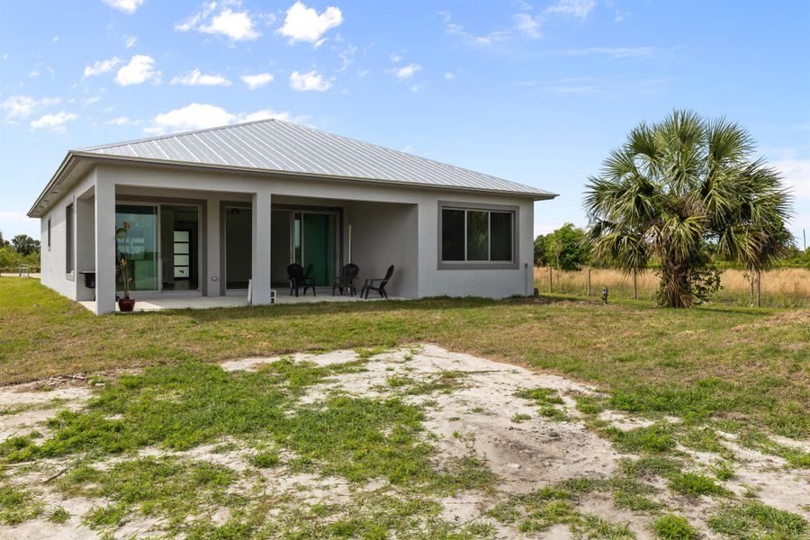 Exterior details and patio area of a home in , Okeechobee (Image 3). Exterior details and patio area of a home in , Okeechobee (Image 3).