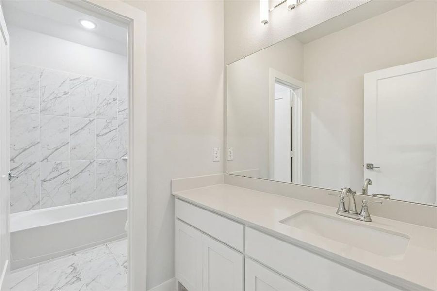 Bathroom in the Masters home plan by Trophy Signature Homes – REPRESENTATIVE PHOTO Bathroom in the Masters home plan by Trophy Signature Homes – REPRESENTATIVE PHOTO