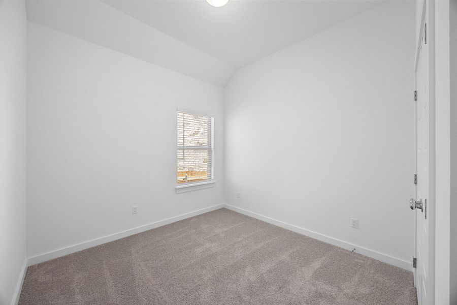 Bedroom in the Pecan II home plan by Trophy Signature Homes – REPRESENTATIVE PHOTO