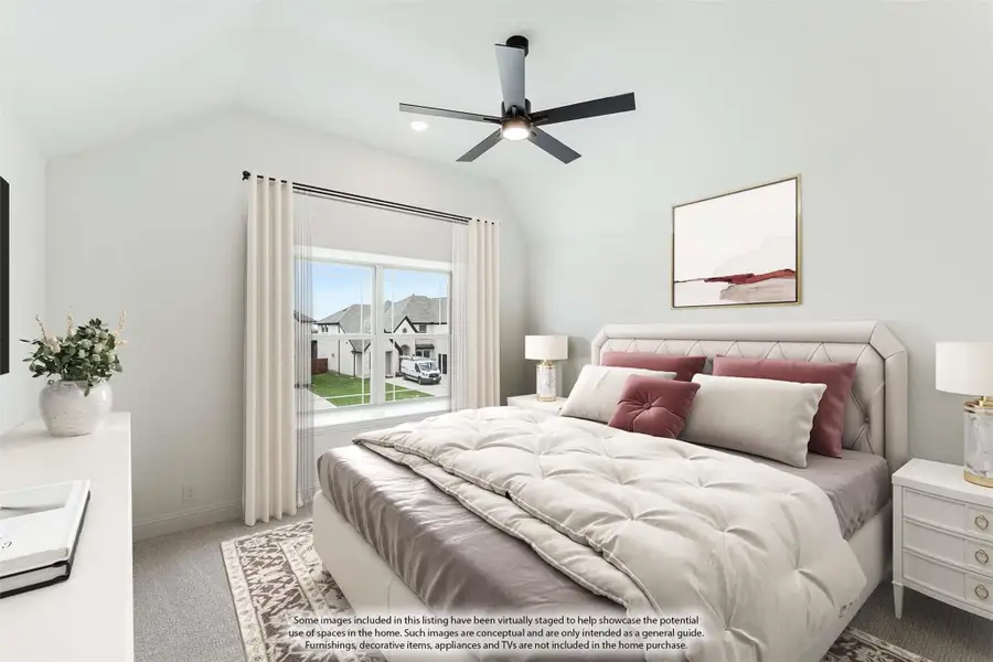 Bedroom with vaulted ceiling, ceiling fan, upholstered bed, and large window with neighborhood view