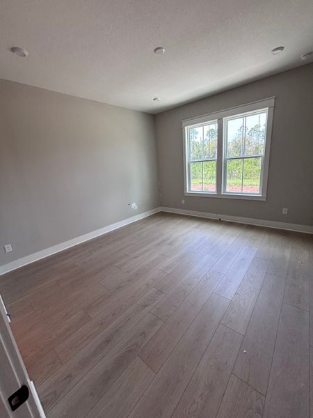 Spacious, unfurnished interior of a new home in The Villas at Longleaf Park, a Watersound Origins® community, Inlet Beach (Image 7). Spacious, unfurnished interior of a new home in The Villas at Longleaf Park, a Watersound Origins® community, Inlet Beach (Image 7).