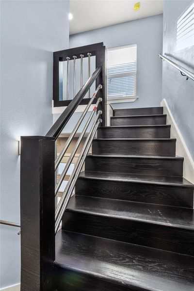 Stairs featuring plenty of natural light