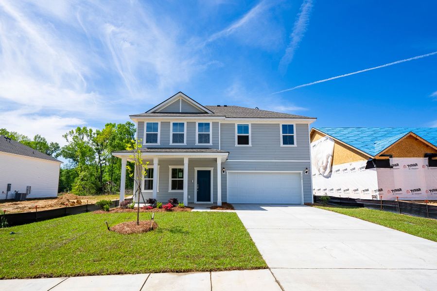 Front exterior of a new home in Monroe Preserve, Chapin, SC, highlighting curb appeal (Image 23).