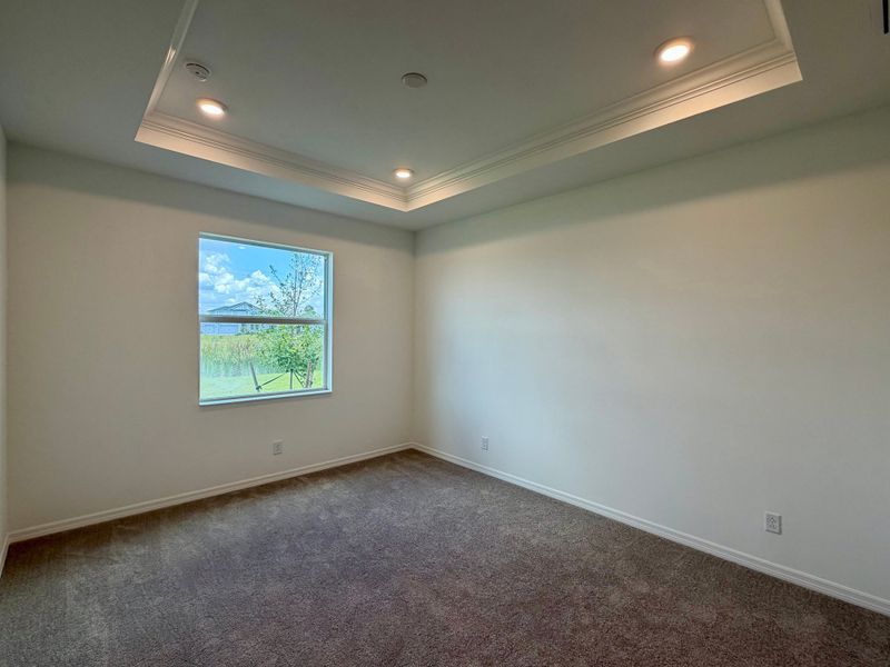 Representative unfurnished interior of a home built from the Juno by William Ryan Homes in The Sanctuary – Resort Collection, Punta Gorda (Image 24).