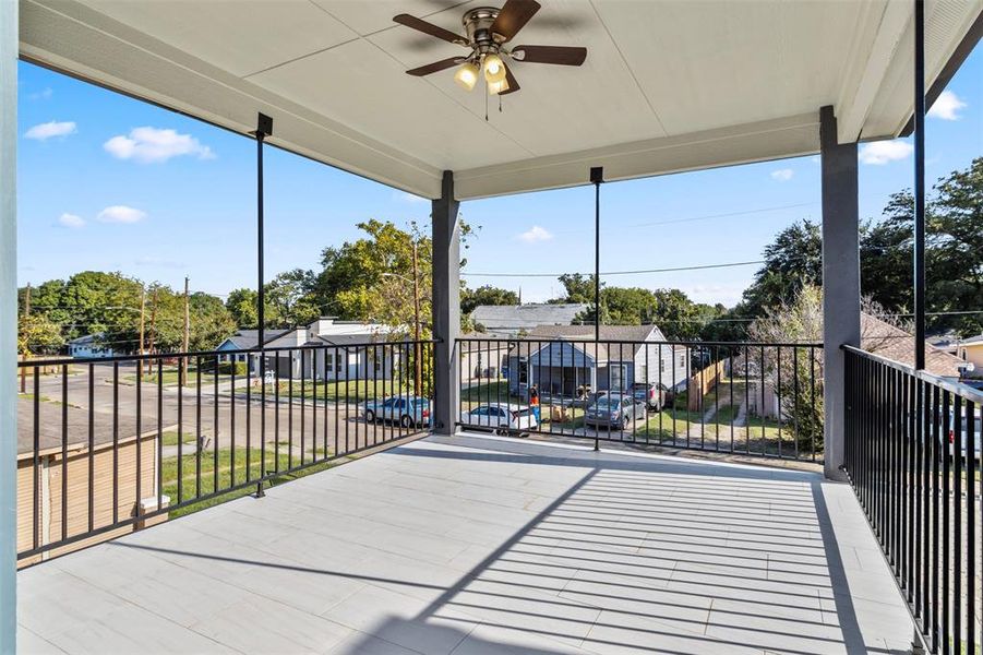 View of patio / terrace featuring a balcony and ceiling fan