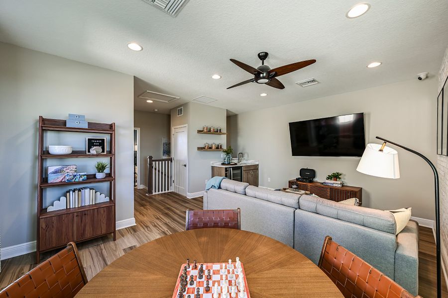 Representative furnished interior of a home built from the Biscayne II by Homes by WestBay in Oakfield, Parrish (Image 23).