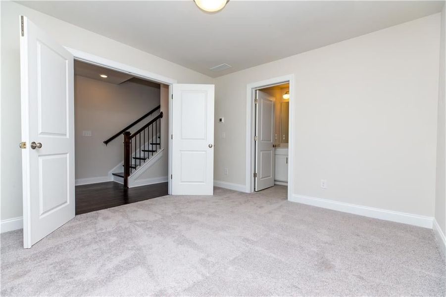 Great space with french doors on the terrace level. Photo for representation purposes only, not of actual home but a  previously built TPG home.