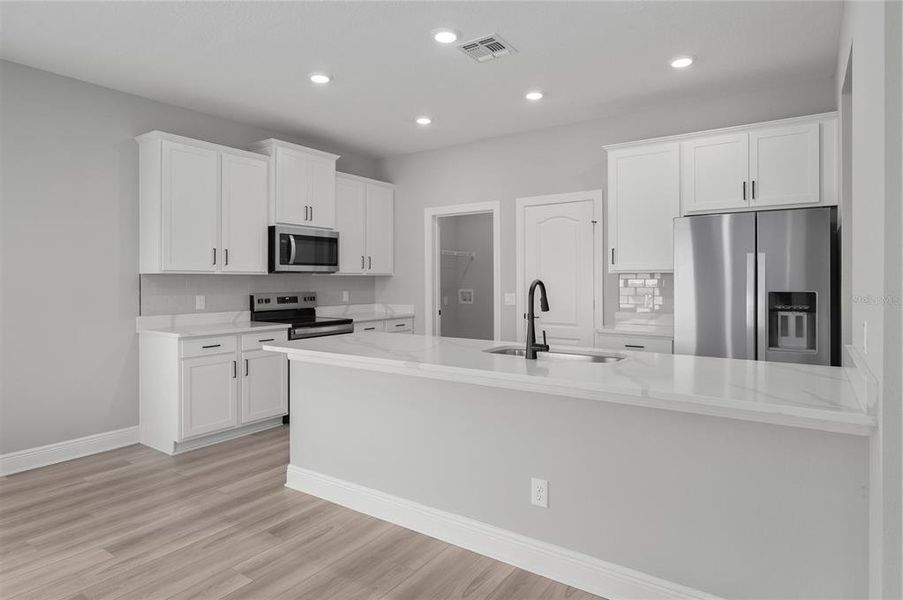 Furnished interior view inside a new home in Gum Lake Preserve, Lake Alfred (Image 9). Furnished interior view inside a new home in Gum Lake Preserve, Lake Alfred (Image 9).