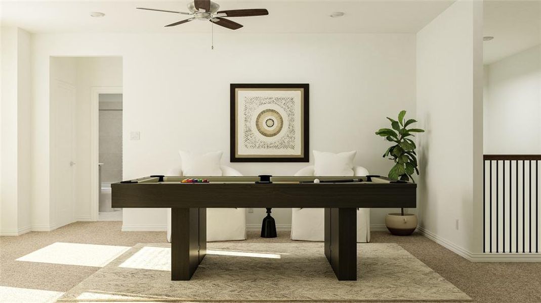 Recreation room with ceiling fan and light colored carpet