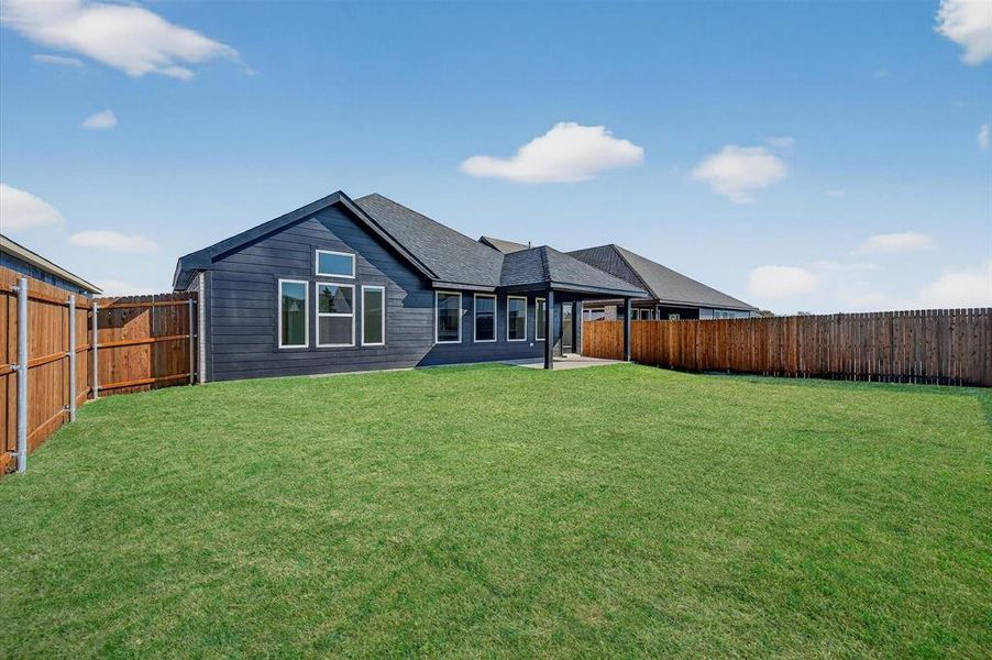 Exterior details and patio area of a home in Hickory Hill, Sherman (Image 23). Exterior details and patio area of a home in Hickory Hill, Sherman (Image 23).