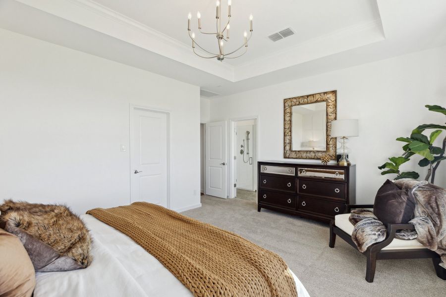 Primary suite with chandelier