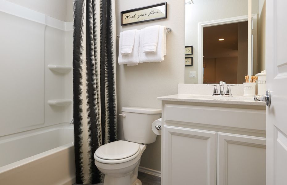 Furnished interior in a model home at Summerlyn in Leander (Image 32).